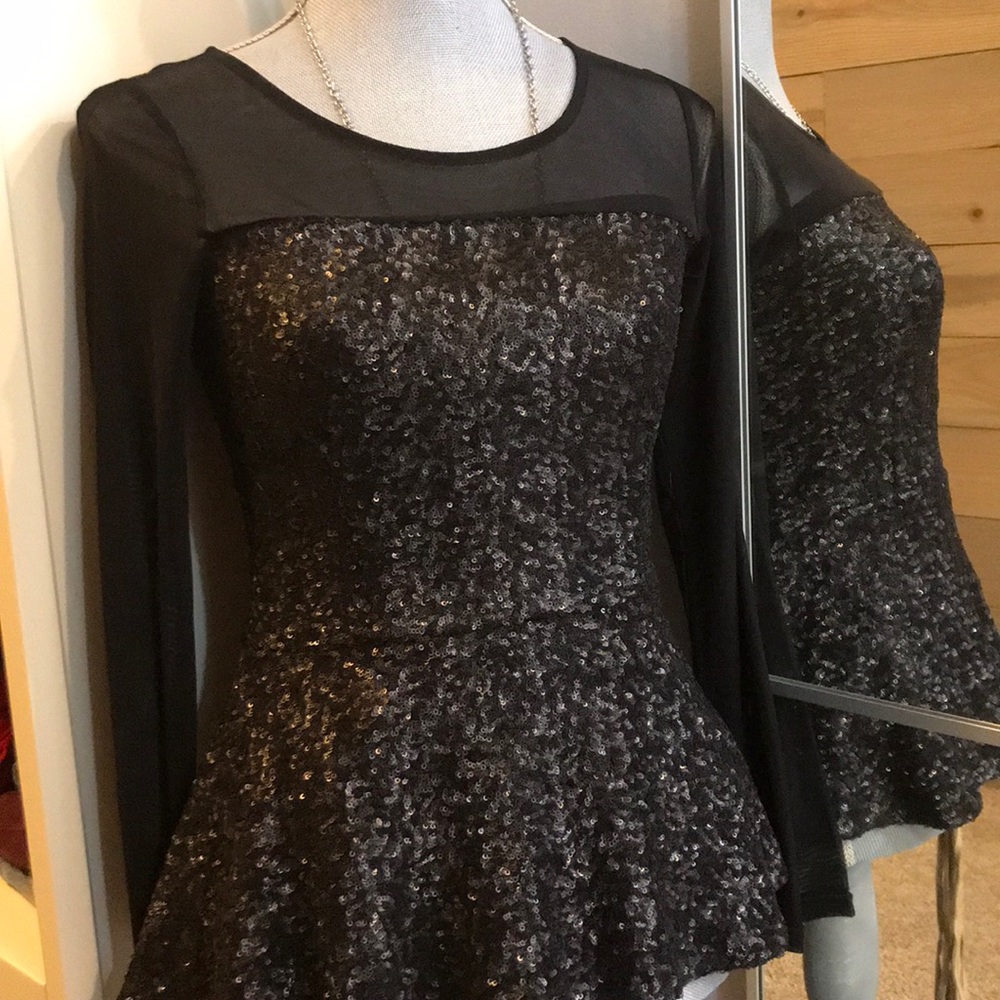Sequence peplum top